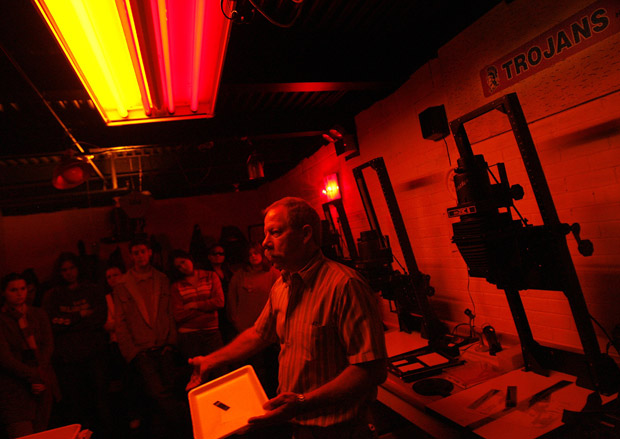Our own Jeff Grimm in the Trinity HS darkroom.