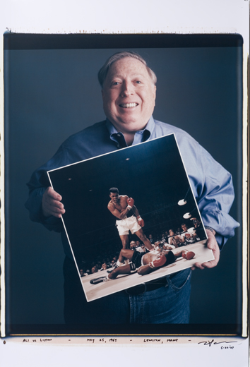 Neil Leifer with his photo in the book by Tim Mantoani